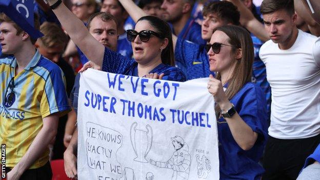 Chelsea fans hold a Thomas Tuchel banner