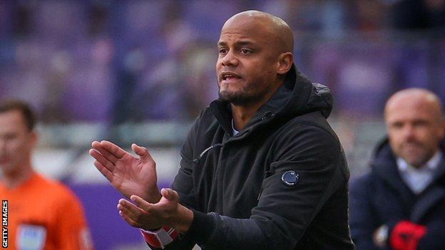 Vincent Kompany encourages his players from the sidelines