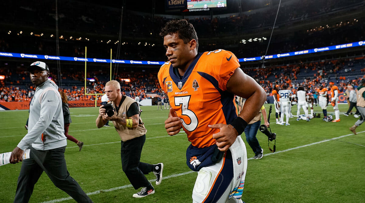 Russell Wilson leaves the field after the Broncos lose to the Colts
