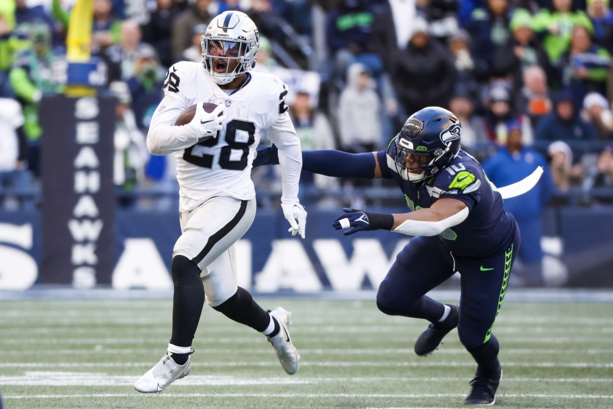 Raiders running back Josh Jacobs carried 33 times for 229 yards, including an 86-yard TD in overtime to beat the Seahawks in Week 12.